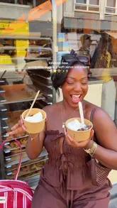 A creator visits Puffy in London to review their viral 'scoopable cookie' served with soft serve ice cream, highlighting the texture and the experience of eating it.