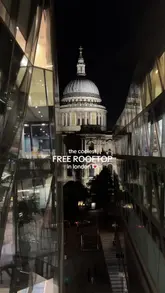 A short, atmospheric montage showcasing the night-time view of St Paul's Cathedral from the One New Change rooftop in London. The video uses text overlays to highlight that the location is free to access and requires no booking.