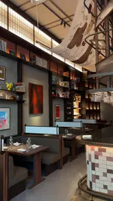 A promotional reel featuring a visit to Mitsu in Shoreditch, London. The video highlights the restaurant's Japanese-inspired interior and a variety of dishes including wagyu katsu sando, soft shell crab, sashimi, nigiri, sake temaki, unagi una don, and matcha cheesecake. The creator provides a voiceover review while showcasing the dining experience.