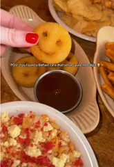 A review of Hometown cafe in Belfast, highlighting its nostalgic menu items like smiley-face potato sides, cereal bowls, and retro-style desserts.