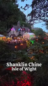 A montage video showcasing Shanklin Chine, a natural gorge attraction on the Isle of Wight, highlighting its scenic paths, waterfalls, and evening illumination.