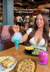 A promotional reel for 'Happy' in London, showcasing theatrical food and drink presentations, including tableside service and interactive cocktails.