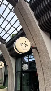 A fast-paced, engaging vlog-style reel showcasing a bottomless brunch experience at Bar Arriba in Olympia, London, featuring tacos, cocktails, and rooftop views.