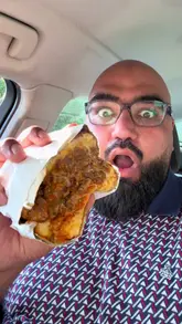 A candid review of a takeaway meal from The Scran Guys in Manchester, featuring a Philly cheesesteak toastie, loaded fries, and a Parmo Munchbox. The creator provides honest, score-based feedback on each item, highlighting the best and worst parts of the meal.