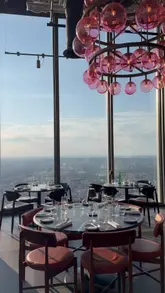 A montage of shots showcasing the interior, food, drinks, and skyline views at Bread Street Kitchen, 22 Bishopsgate.