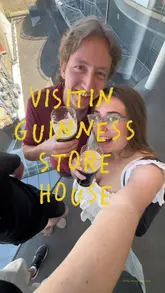 A couple visits the Guinness Storehouse in Dublin, exploring the seven floors of exhibits, the brewing process, the tasting room, and the rooftop bar.