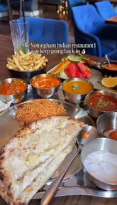 A promotional video for Lagan Tapas in Nottingham, featuring a montage of the restaurant's interior, cocktail menu, and various Indian dishes including a thali, cauliflower, and dessert.