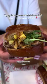 A short review of 'Loaf' in Clerkenwell, London, showcasing their brioche sandwiches, including a chicken caesar sandwich and a french butter steak sando, along with cheesecake french toast sticks.