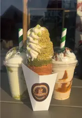 A short, montage-style video showcasing Twist & Bake in Selly Oak, featuring the preparation and presentation of their Hungarian-style chimney cakes, including sweet ice cream cones and savoury rolls.
