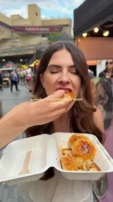 A vibrant, fast-paced vlog showcasing a visit to the Southbank Centre food market in London, highlighting various independent food traders including jerk chicken focaccia, Vietnamese bao, banana pudding, and cookies.