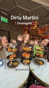 A group of friends visits Dirty Martini in Manchester for a bottomless brunch, showcasing the venue's atmosphere, the 'birdcage' food presentation, and the variety of drinks included in the £30 weekday offer.