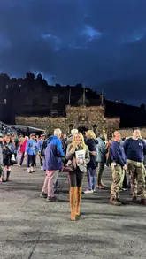 A creator celebrates reaching 750,000 followers by attending the Edinburgh Tattoo at Edinburgh Castle, featuring highlights of the military bands, pipe performances, and fireworks.