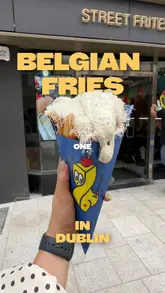 A short, engaging vlog-style video showcasing a visit to Street Frites in Dublin, highlighting their loaded Belgian fries and the preparation process.