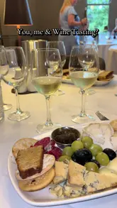 A montage video showcasing a wine tasting event at Eslington Manor, featuring shots of wine glasses, charcuterie boards, the venue interior, and the sommelier presenting to guests.
