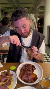 A couple reviews the new menu at Tartuffe, a Manchester bistro, highlighting their starters, steaks, and cocktails.