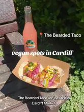 A listicle-style video showcasing various vegan-friendly dining spots in Cardiff, including cafes, market stalls, and health-focused eateries.