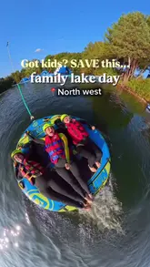 A high-energy, fast-paced reel showcasing a family day out at an aqua park and lake activity center, featuring inflatable obstacle courses and ringo rides.