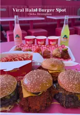A fast-paced, high-energy food showcase video featuring a variety of smash burgers, loaded fries, and chicken strips at Chicka in Birmingham. The video uses quick cuts and close-up shots to highlight the textures and quality of the food, set against the venue's distinctive pink neon interior.