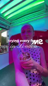 A vlog-style video where the creator visits a Snog frozen yogurt shop located in a double-decker bus in London, showcasing the ordering process, toppings, and the unique seating area.