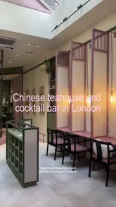 A creator visits Lotus Realm in London, showcasing its transition from a contemporary Chinese teahouse during the day to a cocktail bar at night. The video highlights the aesthetic interior, the tea tasting experience, and specific menu items like the Lucid Cloud drink and jasmine green tea cake.