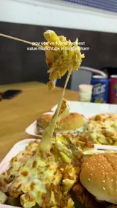 A short promotional video showcasing the 'Fatty Box' from Motoo's in Birmingham, highlighting the value for money with shots of the burger, loaded fries, and churros.