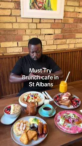 A short promotional video for The Breakfast Club in St Albans, featuring a variety of brunch dishes including pancakes, waffles, French toast, and a granola bowl. The video includes shots of the food, the menu, and the venue exterior, with the creator sampling the food.