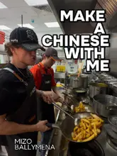 A high-energy, behind-the-scenes vlog featuring a creator cooking and tasting various Chinese takeaway dishes at Mizo in Ballymena. The video focuses on the preparation process, showcasing the kitchen environment and the final, saucy, and appetizing dishes.