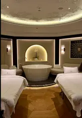 A cinematic venue tour of the Guerlain Spa at The OWO in London, showcasing the reception, relaxation areas, swimming pool, and treatment rooms with a focus on the luxury aesthetic.