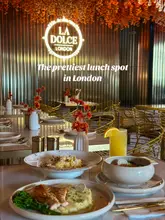 A short, aesthetic montage showcasing the interior and various dishes at La Dolce London, highlighting the floral decor and appetizing food presentation.