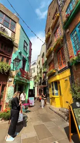 A short, punchy promotional video for Sourdough Sophia in Neal's Yard, Covent Garden. The video features quick cuts of the bakery's exterior, interior, and a variety of baked goods including sourdough loaves, cookies, pastries, and a salmon toast, set to upbeat music.
