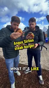 Two creators review a sirloin steak burger from the Irish Angus Producers Group stall at the Ploughing Festival, discussing the price and quality of the food.