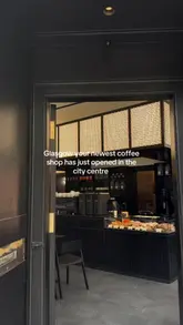 A short, punchy reel showcasing the opening of Thomsons coffee shop in Glasgow city centre. The video features quick cuts of the exterior, the interior decor, the menu, and close-ups of coffee and a cinnamon bun, providing a clear overview of the new venue.