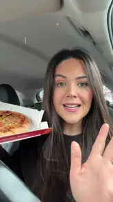 A creator reviews a 'No Brainer' deal from Apache Pizza, showcasing a medium pizza and a side dish while eating in a car.